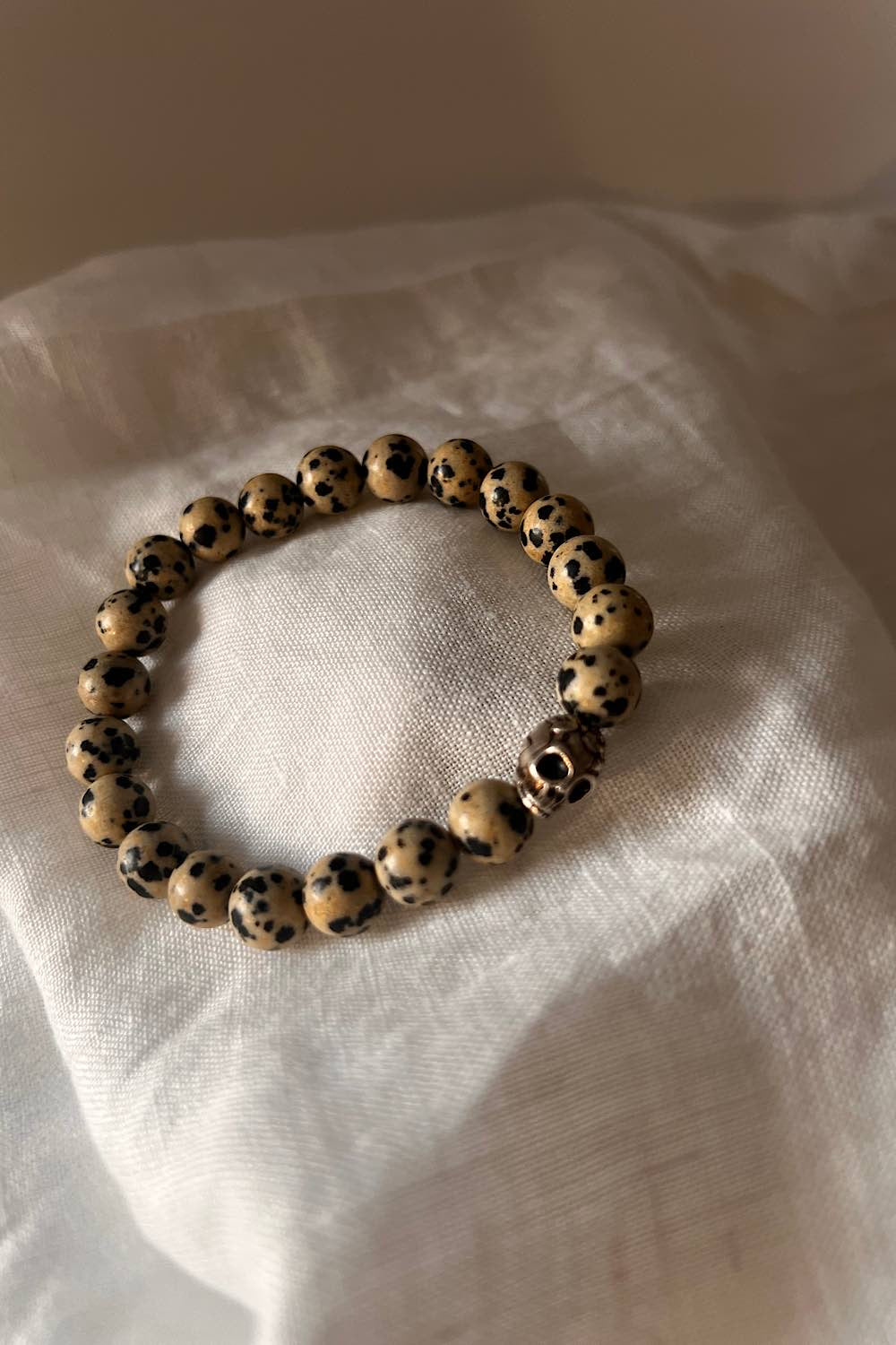 Dalmatian jasper skull bracelet